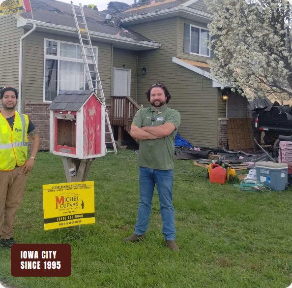 The Cuevas Home Improvement crew on a job site in Iowa City